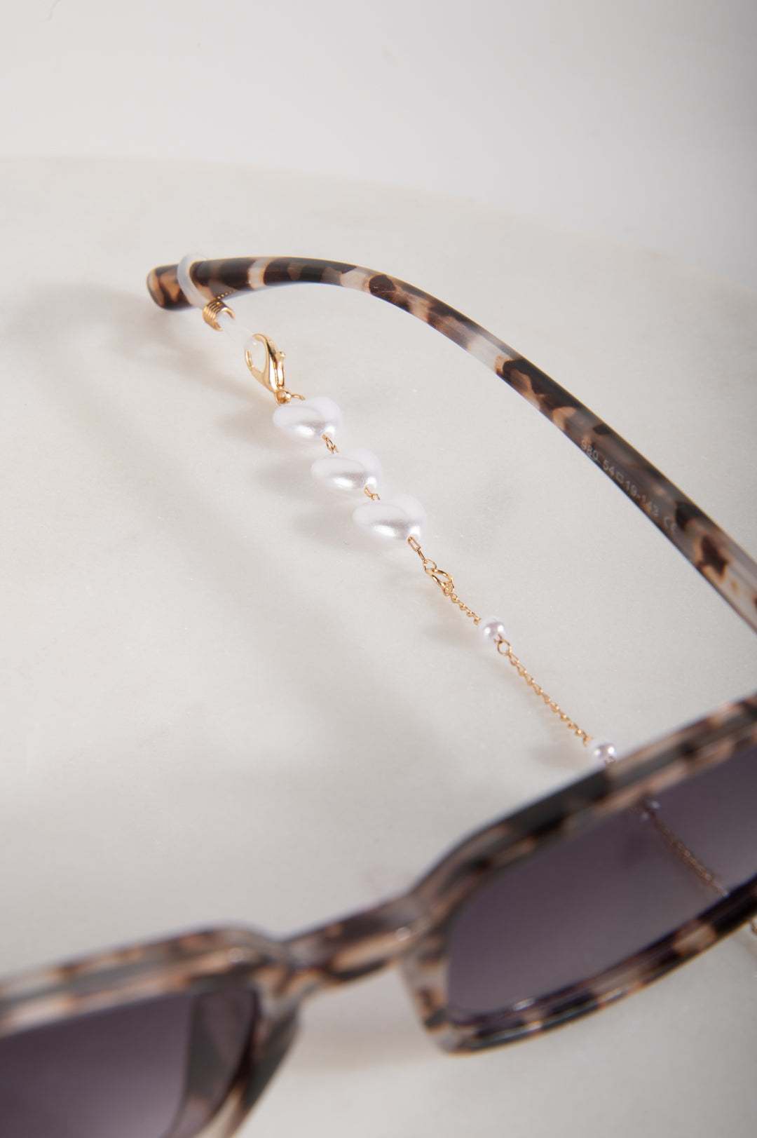 Sonnenbrillenkette mit Anhängern