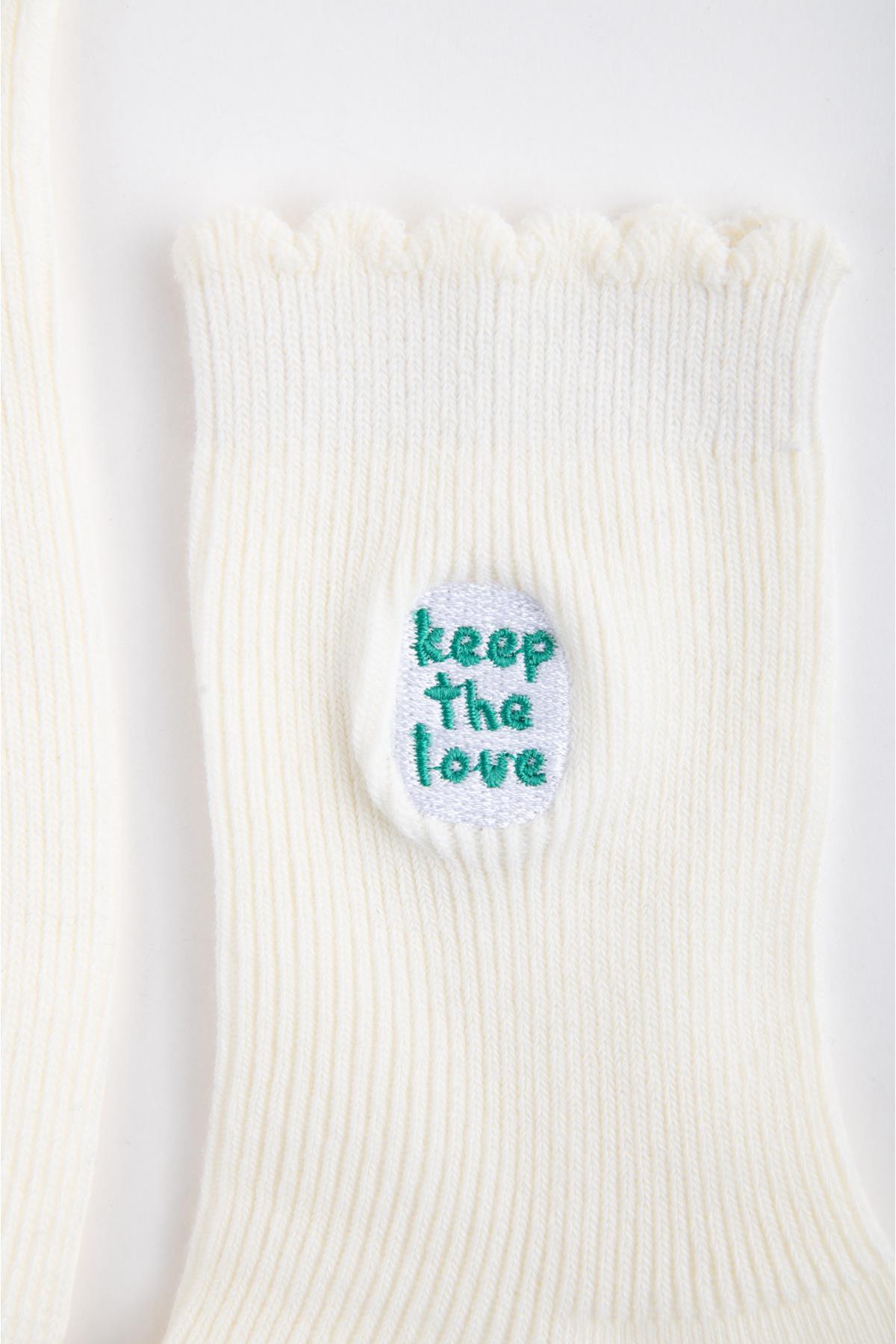 Socken mit Stickerei