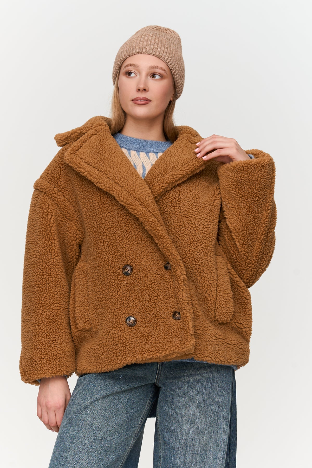 Jacke aus Teddy-Stoff.